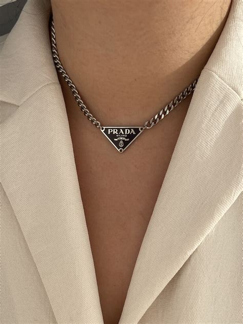 prada symbol necklace.